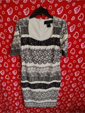 Kardashian Kollection Bodycon Dress featuring a black and white lace print
